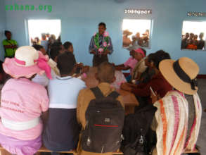 Visitors discussing the future of the school