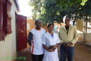 Midwife and husband with the regional director