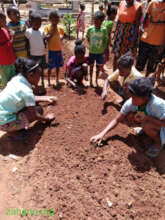 Stundents planting in their school garden