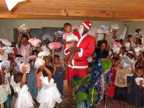 Santa bearing gifts for the children