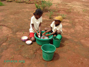 Doing the dishes after school lunch