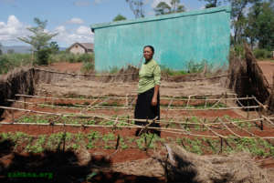Fiarenana's teacher in the school's garden