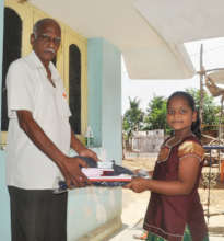 School bag,note books distribution