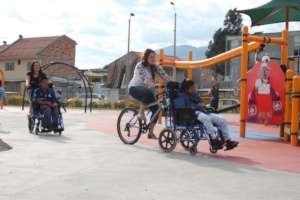 Children play at an inclusive park