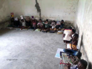 Children at one of the "Pop-up Schools" with their