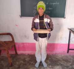 A Young Boy with his Tigers4Ever Education Pack