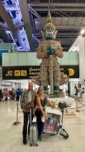Millie with her flight volunteers leaving Bangkok