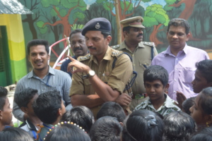 A.C.P ( J.K Dinil) interacting with the children