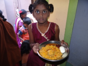 Child with her midday meal