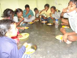 Eating Mid-day meal at rehabilitation center