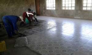 Laying down the tiles in the library