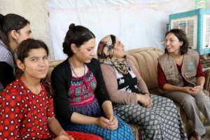 Francesca with an Iraqi family