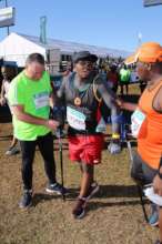 Assisted by other runners