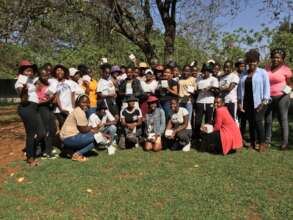 Mentors and mentees pose for a final photo