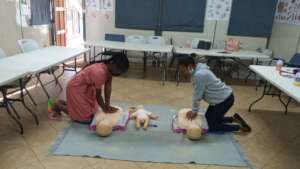 Mentors enjoying First Aid training