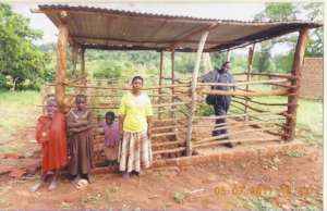 A WOMAN AND A MEMBER OF KWAGAWA ORGANIC FARMERS