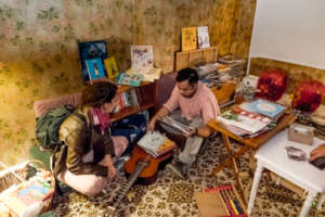 Nasroudin looking for children's books in Pashto