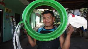 Making animals from used tires brings smiles