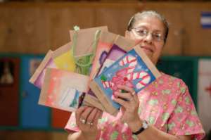 Juanita is a proud Madrina showing products