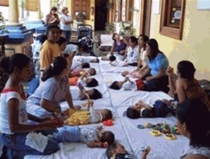 Mothers with bottles for babies