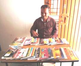 New Life's staff with the books