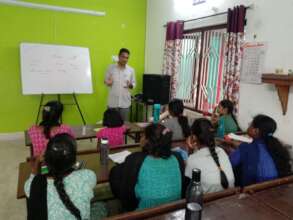 Volunteers Teaching English and Mathematics