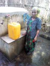 Demekech collecting water just minutes from home