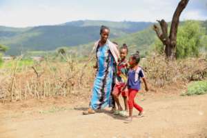 Gebenesh with her son and local children