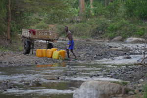 Collecting water using a wagon to assist