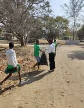 Students picking-up plastic