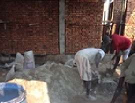Women helping with the construction.