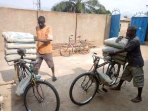Bicycle taxis bringing cement to the building site
