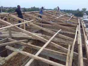 Building the rafters for the maternity ward.
