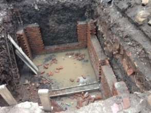 Building the septic tank.