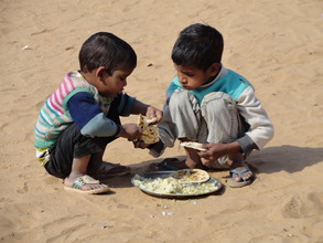Younger siblings tag along to school for a meal
