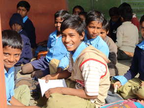 AP beneficiaries studying in outdoor classroom