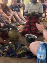 Ayak women group engaged in pottery