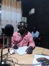 KCIU's Community Engagement officer senstizing CHI