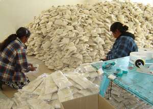 Women Preparing Handmade Sponges for Sale