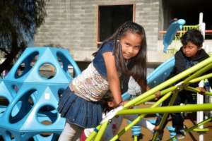 Member playing on new playground