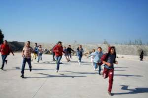 Kids playing on soccer field