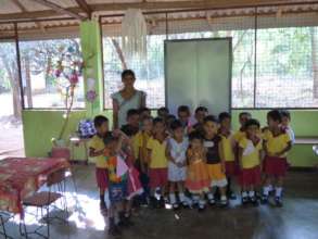 Sujeewa Lakmini and students at Pubudu Pre-School.