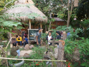 Students relax in the orchid garden