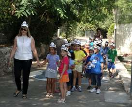 First graders enter their new school.