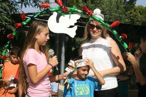 A sixth grader welcomes a new first grader.