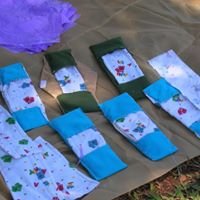 A sanitary pad sewing machine to a womens group