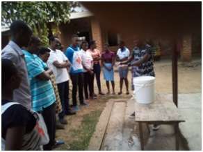 Learning proper hand washing techiques.