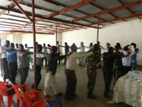 Closing circle during peace dialogue.