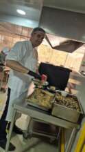 Volunteering to serve lunch at the orphanage