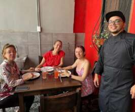 Daniel with neighbours enjoying lunch
